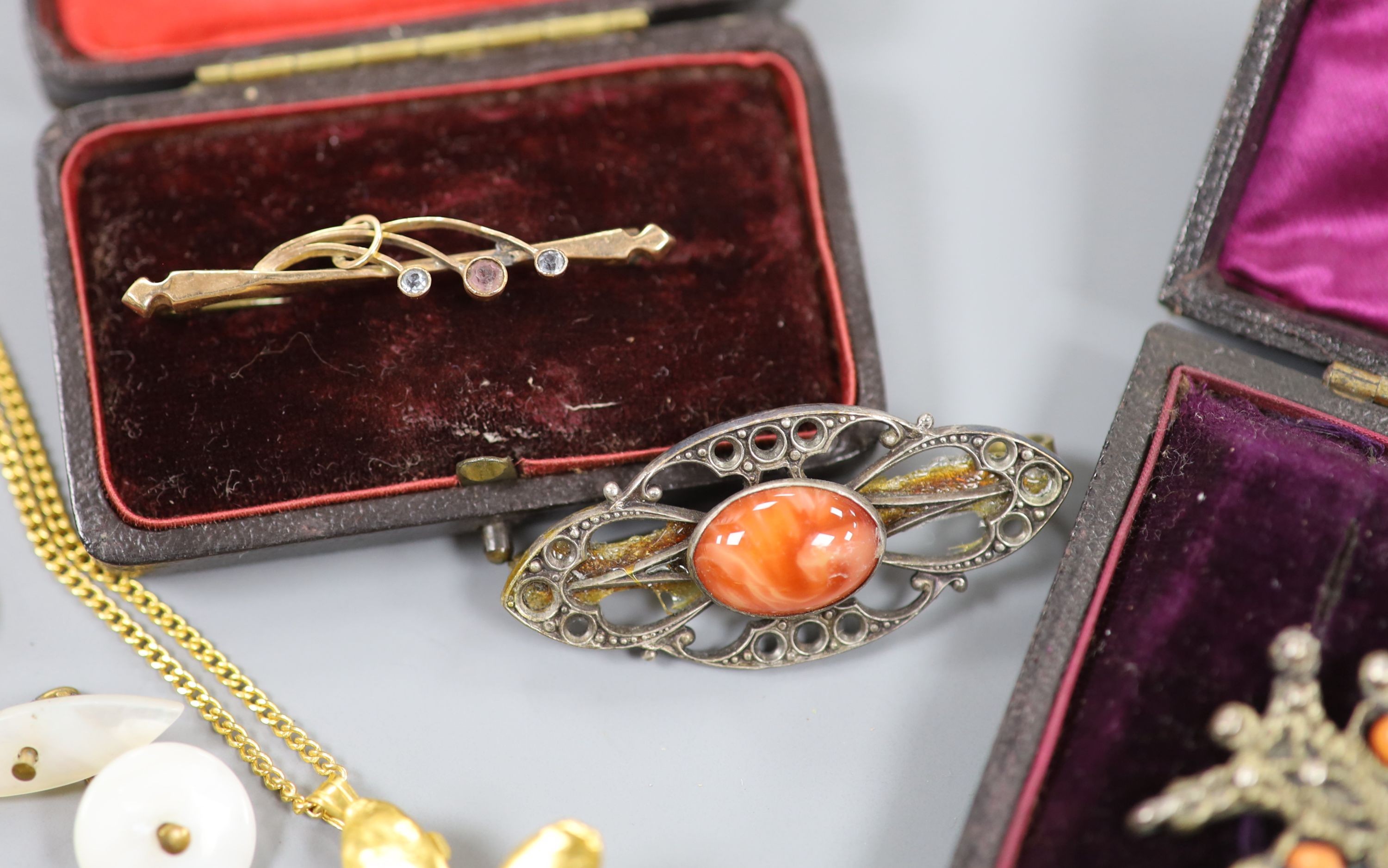 A 9ct gold signet ring, size L, 4.8 grams, a yellow metal locket on a 9ct chain, gross 4.2 grams and other minor jewellery.